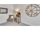 Bright bonus room with stylish decor, including a vintage-style record player and clock at 6179 Ashbranch Dr, Acworth, GA 30101