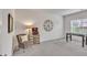 Spacious bonus room featuring decor, foosball table, and natural light at 6179 Ashbranch Dr, Acworth, GA 30101