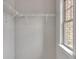 Walk-in closet with shelving, offering ample storage space and natural light at 6179 Ashbranch Dr, Acworth, GA 30101