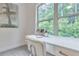 Close up view of desk area with bright window and view of backyard at 6179 Ashbranch Dr, Acworth, GA 30101
