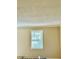 Neutral bedroom featuring a window with blinds and fresh paint at 106 Plantation Dr, Clarkston, GA 30021