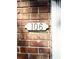 Close-up of the house number '106' against the brick exterior, adding curb appeal at 106 Plantation Dr, Clarkston, GA 30021