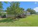 Spacious backyard with wooden deck and lush green grass at 487 Laney Rd, Locust Grove, GA 30248