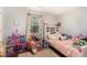 bedroom with lots of natural light and plenty of space for toys at 487 Laney Rd, Locust Grove, GA 30248