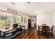 Eat-in kitchen featuring warm wood accents, stainless steel appliances, and views of the backyard at 487 Laney Rd, Locust Grove, GA 30248