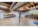 Spacious unfinished basement, ready for customization, with visible ceiling beams at 655 Stone Harbor Sw Pkwy, Marietta, GA 30060