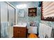 Bathroom with a glass shower and decorative accents throughout at 655 Stone Harbor Sw Pkwy, Marietta, GA 30060