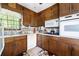 Charming kitchen featuring wood cabinets, stainless steel appliances, and lots of natural light at 655 Stone Harbor Sw Pkwy, Marietta, GA 30060