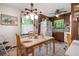 Eat-in kitchen with wood cabinets, neutral color scheme, and stainless steel appliances at 655 Stone Harbor Sw Pkwy, Marietta, GA 30060