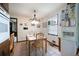 Kitchen with an eat-in table. Appliances in white and a decorative ceiling fan at 655 Stone Harbor Sw Pkwy, Marietta, GA 30060