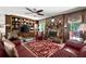 Cozy living room with fireplace, built-in bookshelves, and lots of natural light at 655 Stone Harbor Sw Pkwy, Marietta, GA 30060