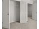 Spacious walk-in closet features ample storage, with bright white walls at 116 Crooked Lake Park, Villa Rica, GA 30180
