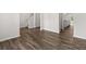 Inviting living room showcasing wood-look flooring, neutral paint, and an open layout at 116 Crooked Lake Park, Villa Rica, GA 30180