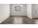 Inviting living room with wood-look flooring, natural light, and neutral paint at 116 Crooked Lake Park, Villa Rica, GA 30180