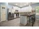 Bright, airy kitchen with modern appliances, granite countertops, and ample cabinet space at 1232 Candler Ct, Morrow, GA 30260
