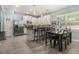Modern kitchen featuring stainless steel appliances, island with seating, and stylish backsplash at 1232 Candler Ct, Morrow, GA 30260
