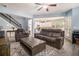 Spacious living room with wood floors, open layout, and natural light at 1232 Candler Ct, Morrow, GA 30260