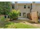 View of the home's backyard featuring a patio and partial fencing at 4221 Rogers Creek Ct, Duluth, GA 30096