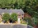 Aerial view of a home featuring a front yard and attached garage at 4221 Rogers Creek Ct, Duluth, GA 30096