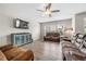Comfortable living room with modern furniture, natural light, and stylish console at 916 Gambino Trce, Peachtree City, GA 30269