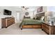 Spacious main bedroom features a wooden bed, large windows, ceiling fan and a dresser set at 916 Gambino Trce, Peachtree City, GA 30269