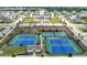 These well-maintained tennis courts are perfect for friendly competition. The pool is also visible at 916 Gambino Trce, Peachtree City, GA 30269
