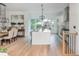 Open floorplan: kitchen with oversized island and stainless steel appliances at 100 Villa Magnolia Ln, Alpharetta, GA 30009