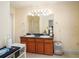 Bathroom featuring a double sink vanity, a large mirror, and a shower stall at 3514 Blackberry Se Ln, Conyers, GA 30094