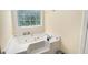 Bathtub with jets and a window for natural light at 3514 Blackberry Se Ln, Conyers, GA 30094
