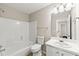 Bathroom with a shower and tub combination, a vanity with a sink, and tile flooring at 486 Windcroft Nw Cir, Acworth, GA 30101