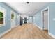 Open-concept living room and kitchen with lots of natural light and modern appliances at 5233 Groovers Landing Se Rd, Acworth, GA 30101