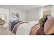 Comfortable bedroom with a window and blue dresser, creating a relaxing and inviting space at 105 Crooked Lake Park, Villa Rica, GA 30180