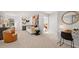 Spacious bonus room with seating area, desk, and accent wall, perfect for relaxation and productivity at 105 Crooked Lake Park, Villa Rica, GA 30180