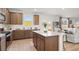 Open concept kitchen with a large island, modern appliances, and plenty of cabinet space at 105 Crooked Lake Park, Villa Rica, GA 30180