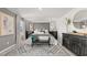 Comfortable main bedroom featuring a plush bed, a decorative rug, and tasteful decor at 105 Crooked Lake Park, Villa Rica, GA 30180
