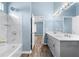 Modern bathroom with double vanity and tiled shower-tub combo at 110 Holly Mill Village Dr, Canton, GA 30114