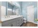Bathroom with double sink vanity, and tile surround shower at 110 Holly Mill Village Dr, Canton, GA 30114