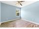 Cozy bedroom with hardwood floors and natural light at 110 Holly Mill Village Dr, Canton, GA 30114