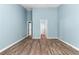 Large bedroom with hardwood floors at 110 Holly Mill Village Dr, Canton, GA 30114
