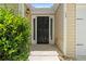 Welcoming front entrance featuring a black door, sidelights, and house number display at 110 Holly Mill Village Dr, Canton, GA 30114