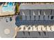 Overhead drone image of townhome community with a large blue kidney-shaped pool and parking lot at 2227 Foley Park St, Snellville, GA 30078