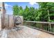 Cozy deck area with a comfortable hanging chair, perfect for relaxation at 2227 Foley Park St, Snellville, GA 30078