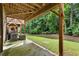 Under deck patio with HVAC units, looking out on a backyard lawn at 2227 Foley Park St, Snellville, GA 30078