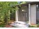 Front entrance of a well-maintained home, highlighting the modern door, stone steps and contemporary design at 3282 Leslie Court Northeast Ne Ct, Atlanta, GA 30345
