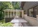 Exterior view featuring a sunroom, patio, and brick accents at 3282 Leslie Court Northeast Ne Ct, Atlanta, GA 30345