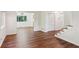 Open-concept living area with hardwood floors, white walls, and natural light at 3282 Leslie Court Northeast Ne Ct, Atlanta, GA 30345