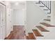 A view of the staircase showcasing hardwood treads, white risers and a dark banister at 3282 Leslie Court Northeast Ne Ct, Atlanta, GA 30345