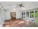 Sunroom features walls of windows, skylights, and access to the home and the outdoor spaces at 3282 Leslie Court Northeast Ne Ct, Atlanta, GA 30345