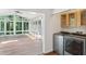 Sunroom adjacent to laundry room offers stunning views of the private, wooded backyard at 3282 Leslie Court Northeast Ne Ct, Atlanta, GA 30345