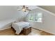Bedroom boasts light walls, hardwood floors, and a ceiling fan at 3219 Parkridge Crescent, Chamblee, GA 30341